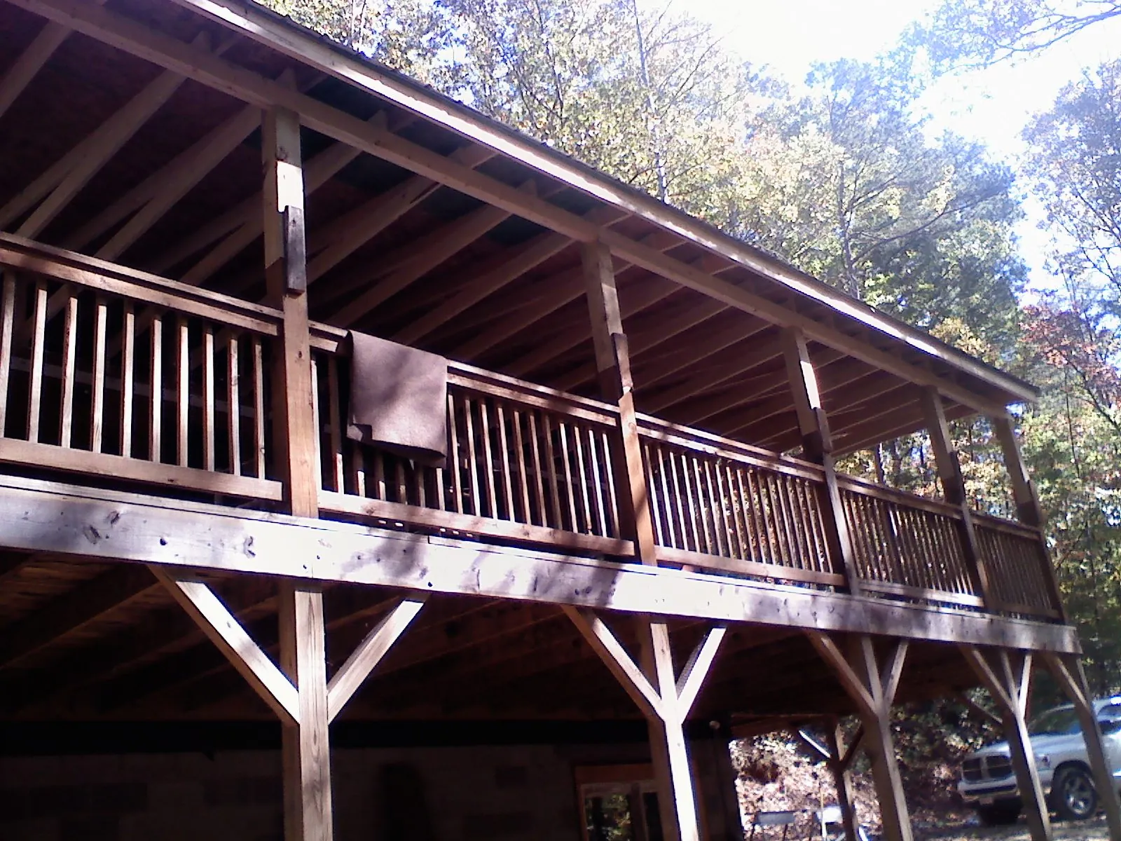 Timber framing under a new elevated porch and deck — Roof Leak Repair in Dodge Center by Roofing Brothers